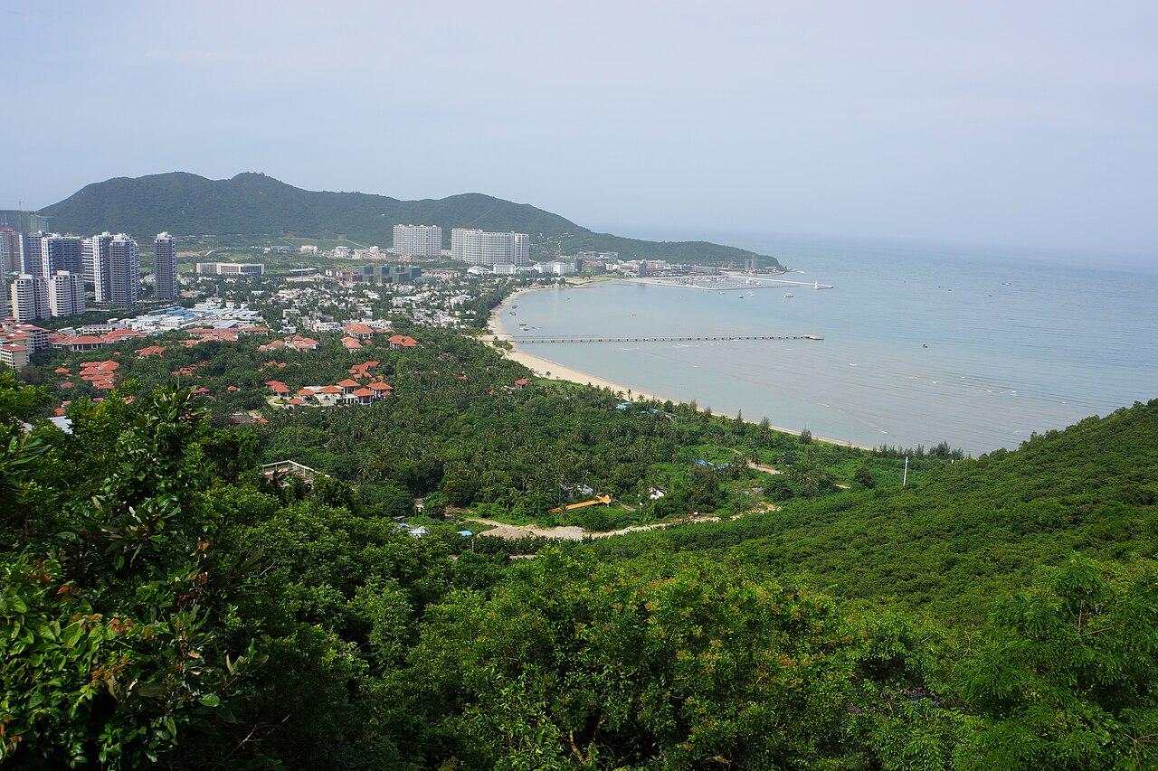 Sanya Bay with beaches and green hills viewed from Luhuitou Park
